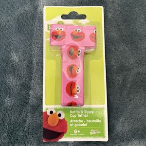 Petite Creations No Throw Bottle And Sippy Cup Tether Elmo Pink